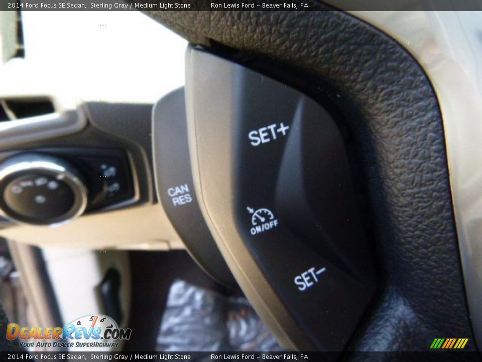 2014 Ford Focus SE Sedan Sterling Gray / Medium Light Stone Photo #18