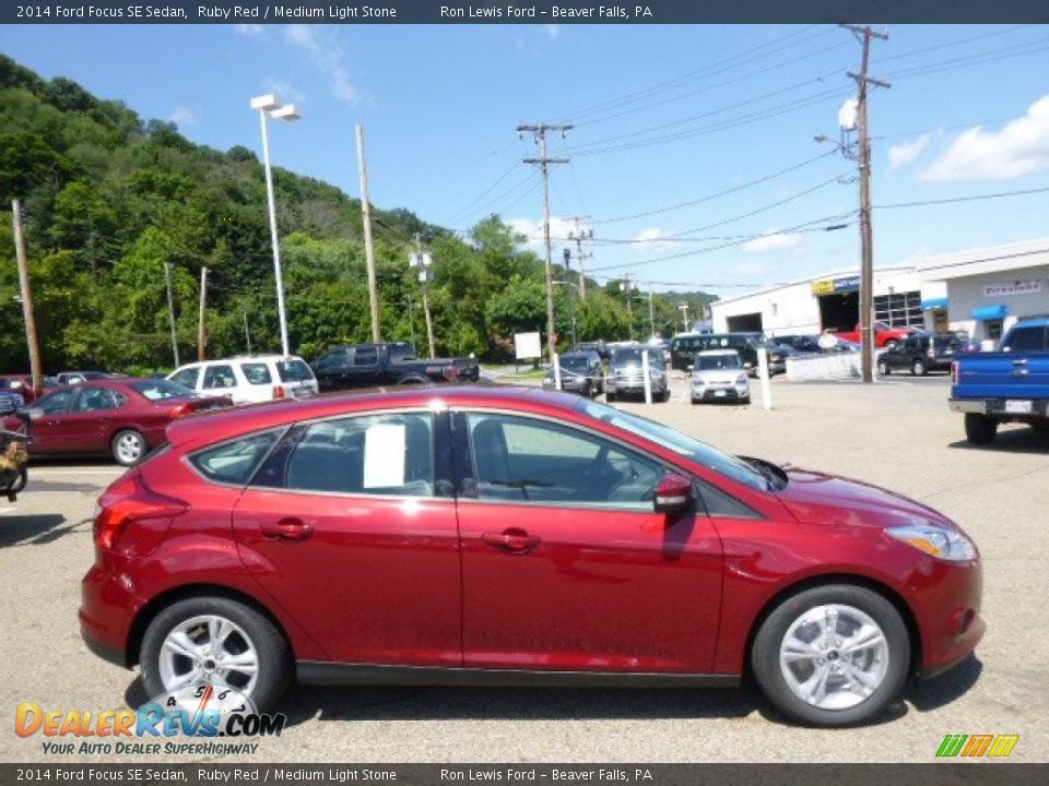 2014 Ford Focus SE Sedan Ruby Red / Medium Light Stone Photo #1