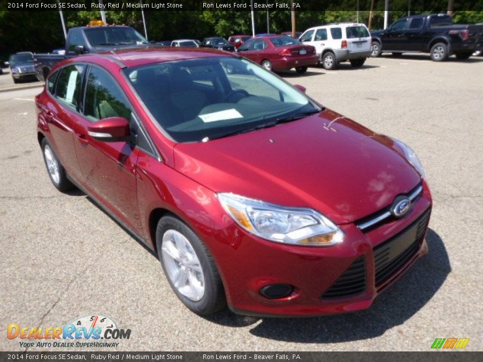 2014 Ford Focus SE Sedan Ruby Red / Medium Light Stone Photo #2
