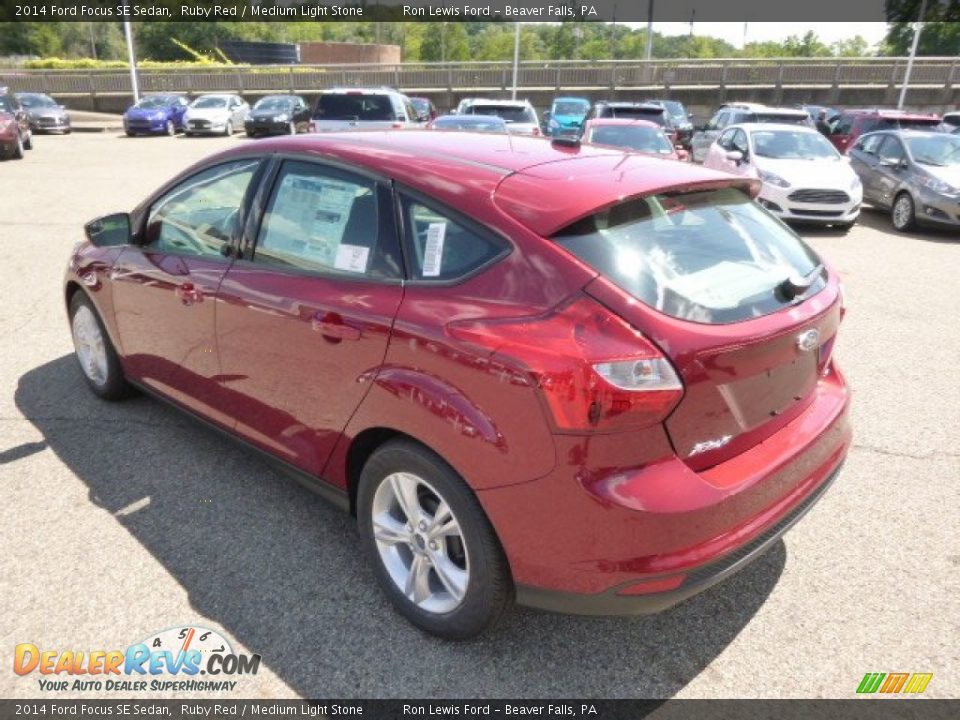 2014 Ford Focus SE Sedan Ruby Red / Medium Light Stone Photo #6
