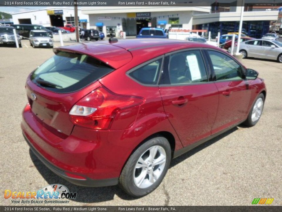 2014 Ford Focus SE Sedan Ruby Red / Medium Light Stone Photo #8