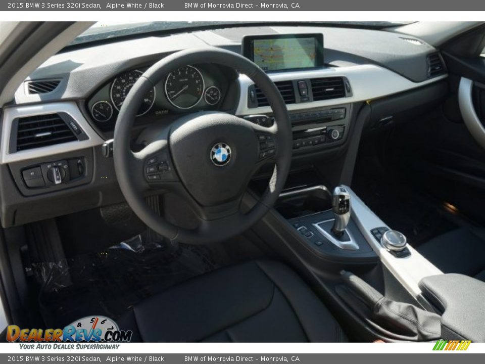 Dashboard of 2015 BMW 3 Series 320i Sedan Photo #6
