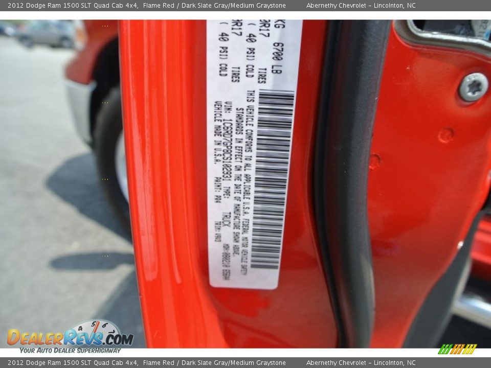2012 Dodge Ram 1500 SLT Quad Cab 4x4 Flame Red / Dark Slate Gray/Medium Graystone Photo #7