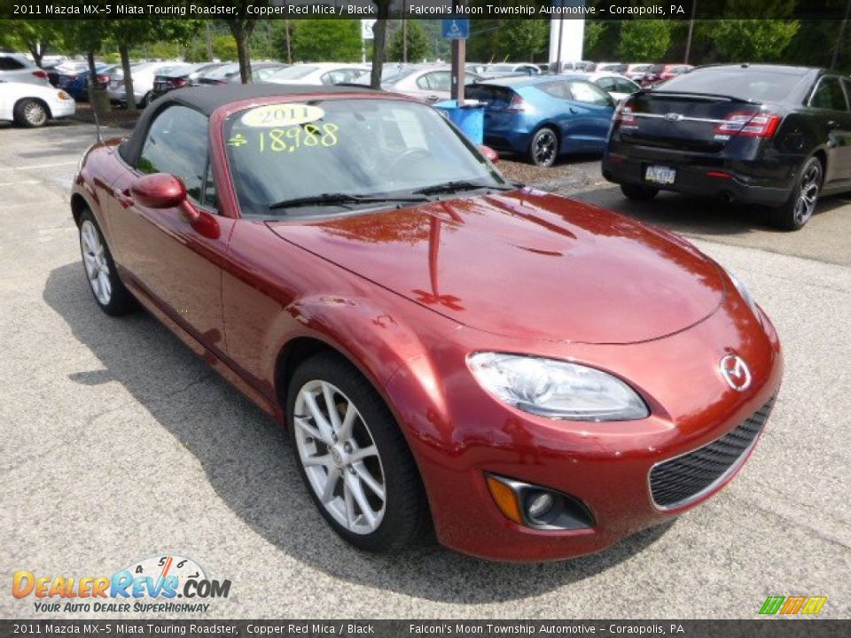 Front 3/4 View of 2011 Mazda MX-5 Miata Touring Roadster Photo #7