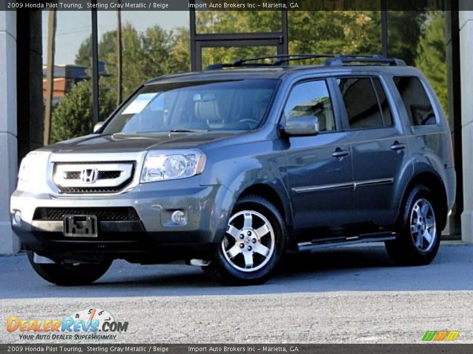 Front 3/4 View of 2009 Honda Pilot Touring Photo #1