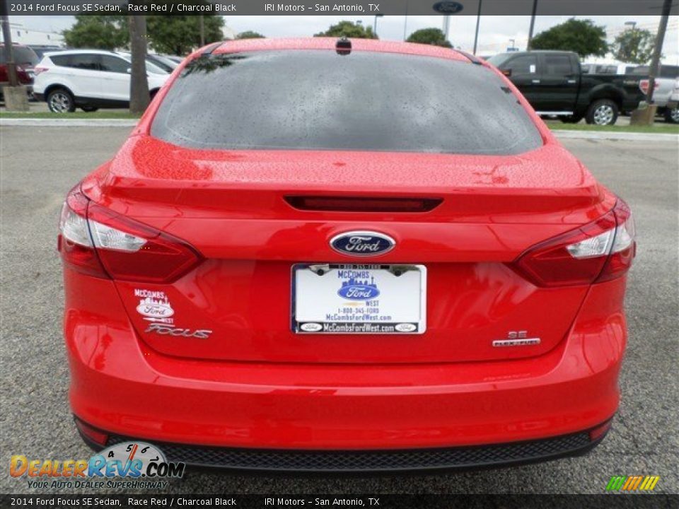 2014 Ford Focus SE Sedan Race Red / Charcoal Black Photo #4