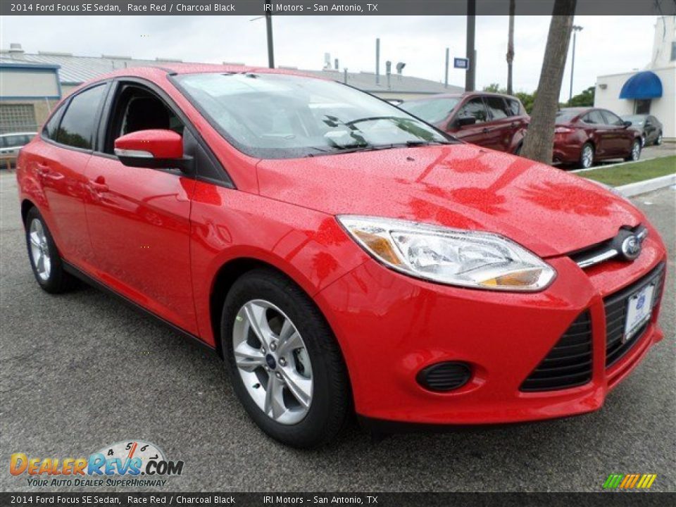 2014 Ford Focus SE Sedan Race Red / Charcoal Black Photo #7