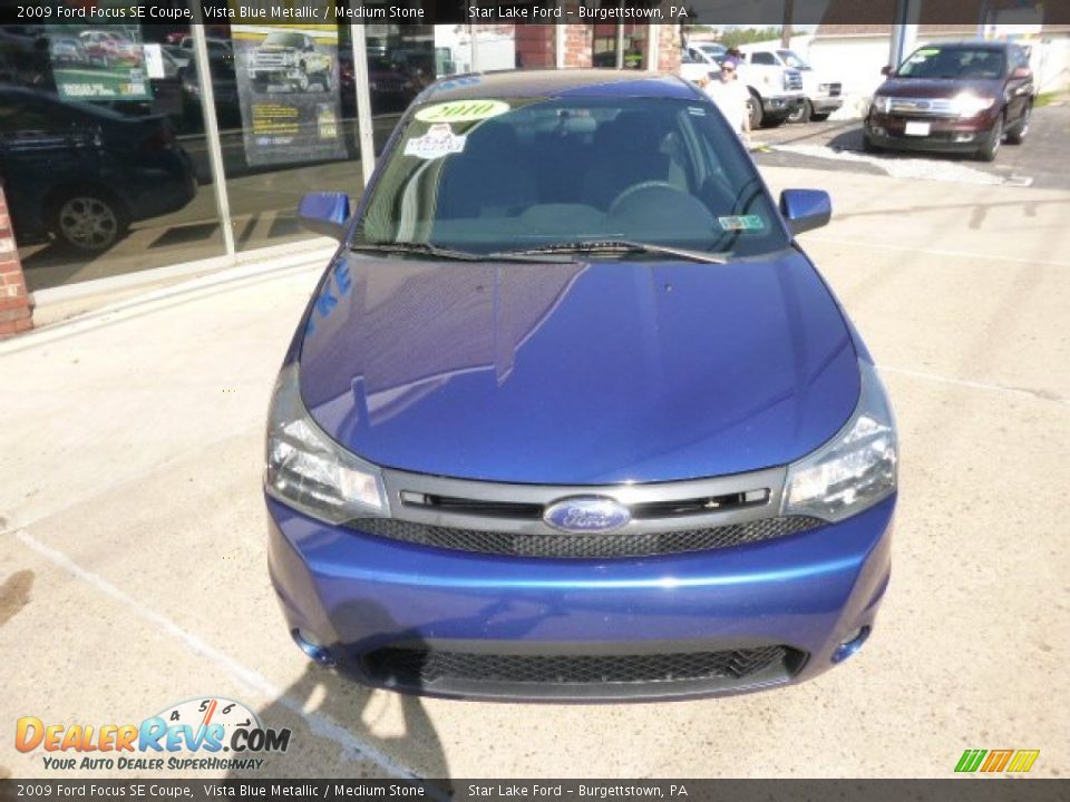 2009 Ford Focus SE Coupe Vista Blue Metallic / Medium Stone Photo #2