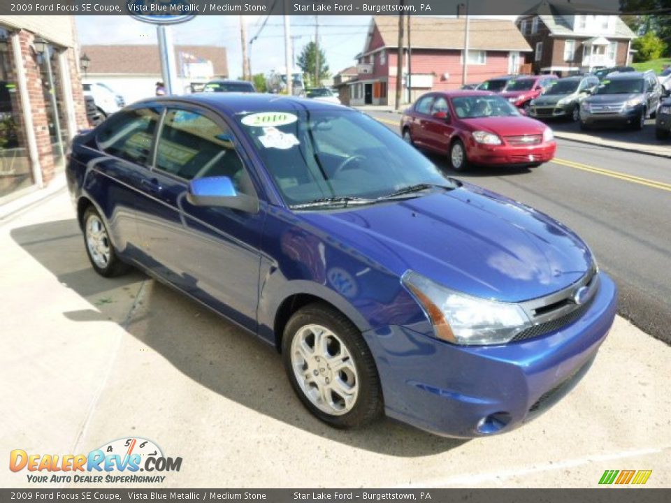 2009 Ford Focus SE Coupe Vista Blue Metallic / Medium Stone Photo #3