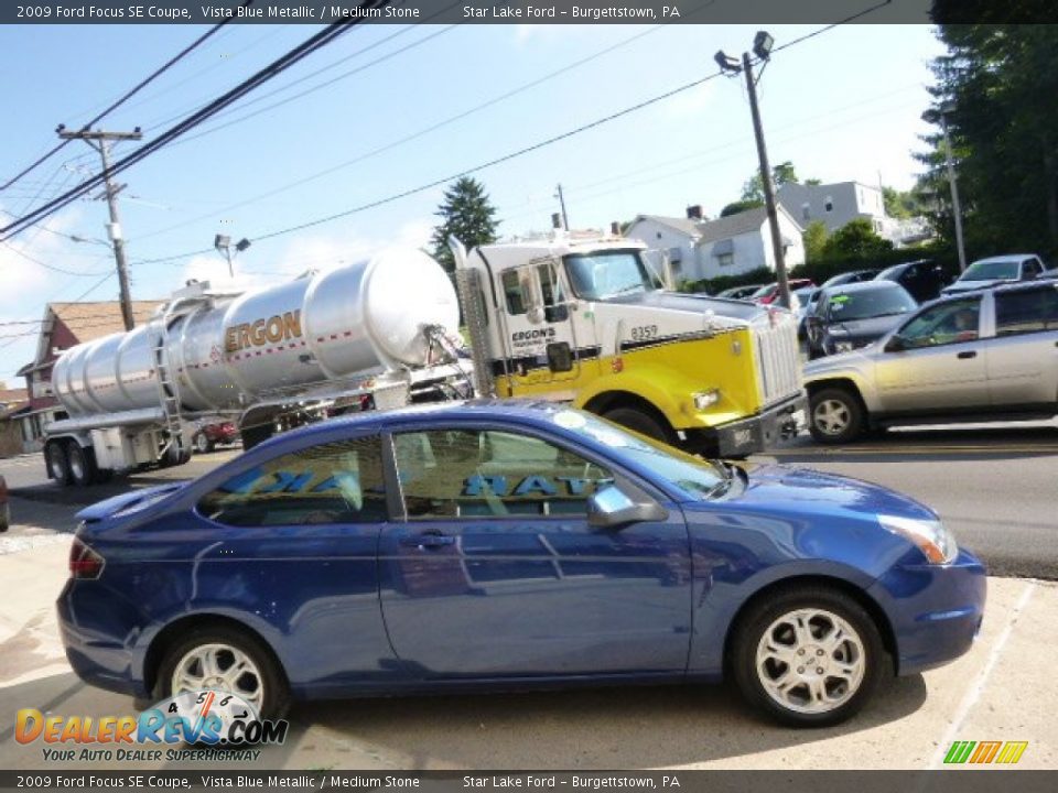 2009 Ford Focus SE Coupe Vista Blue Metallic / Medium Stone Photo #4