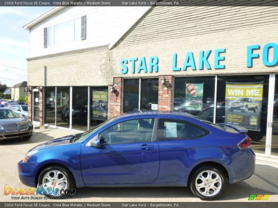 2009 Ford Focus SE Coupe Vista Blue Metallic / Medium Stone Photo #8