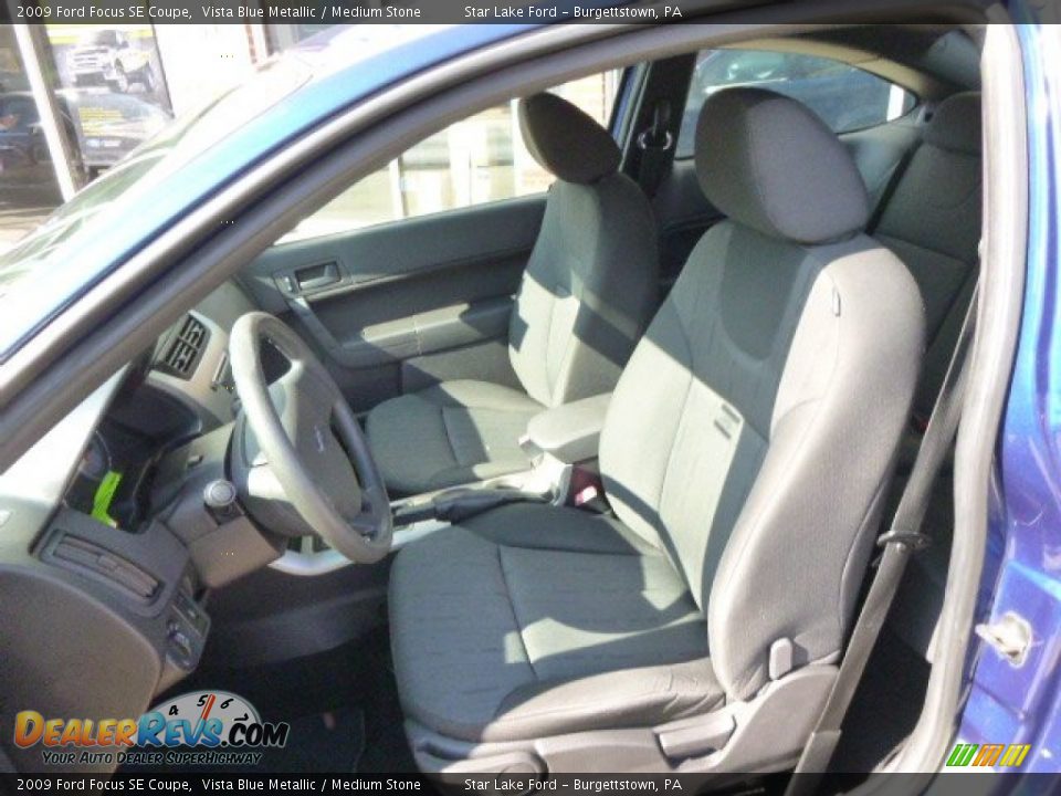 2009 Ford Focus SE Coupe Vista Blue Metallic / Medium Stone Photo #10