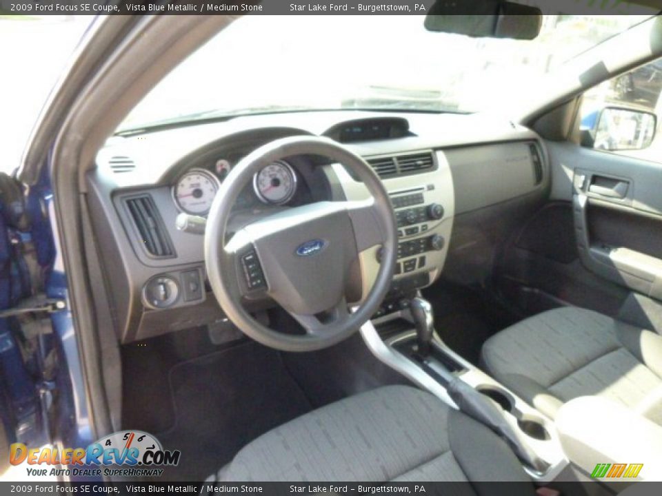 2009 Ford Focus SE Coupe Vista Blue Metallic / Medium Stone Photo #13