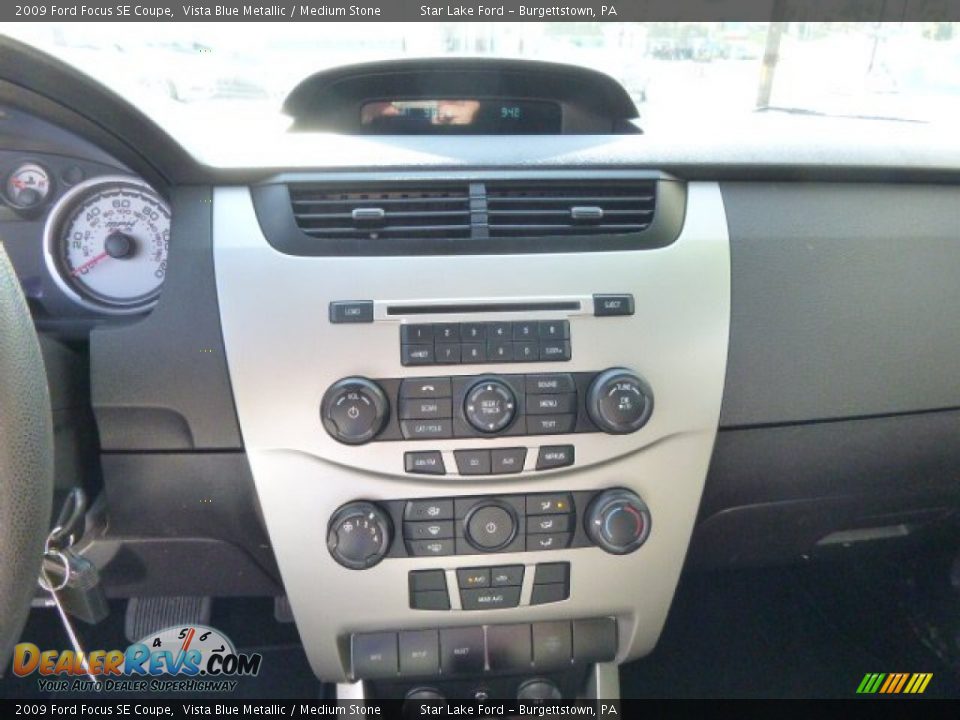 2009 Ford Focus SE Coupe Vista Blue Metallic / Medium Stone Photo #16
