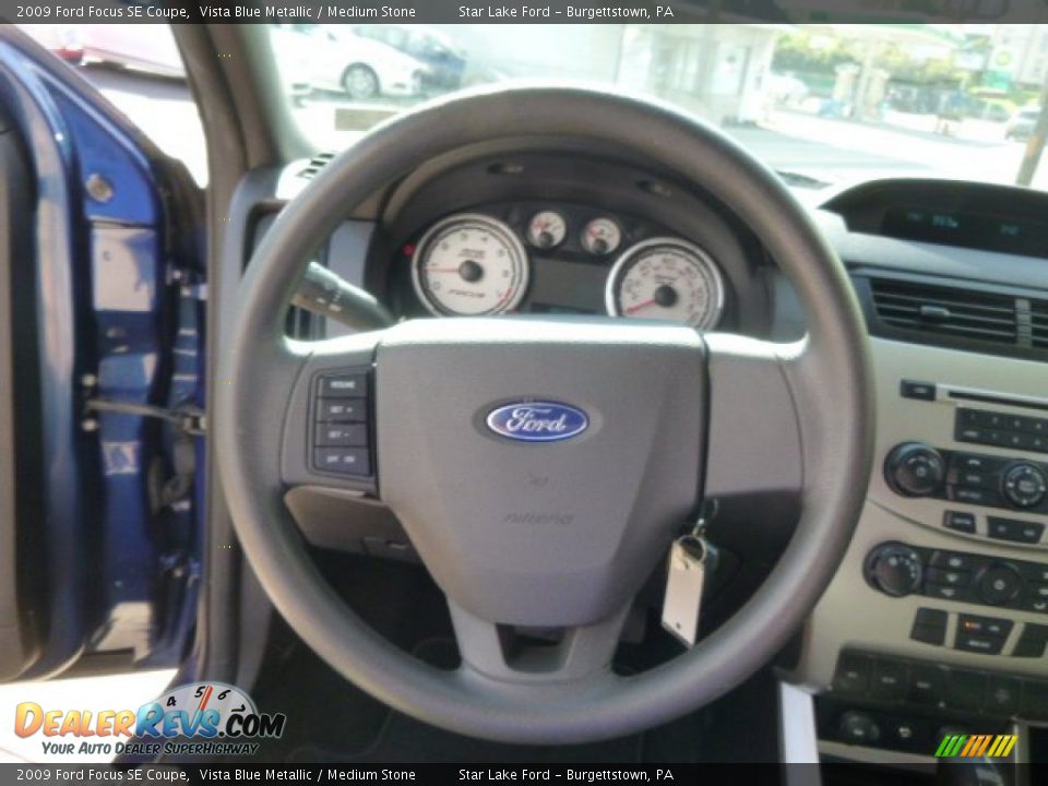 2009 Ford Focus SE Coupe Vista Blue Metallic / Medium Stone Photo #19