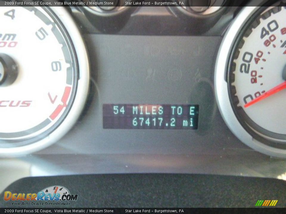 2009 Ford Focus SE Coupe Vista Blue Metallic / Medium Stone Photo #20