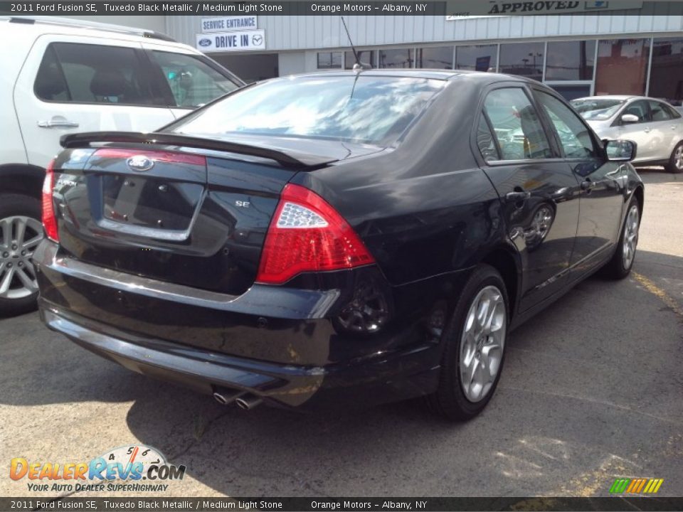 2011 Ford Fusion SE Tuxedo Black Metallic / Medium Light Stone Photo #5