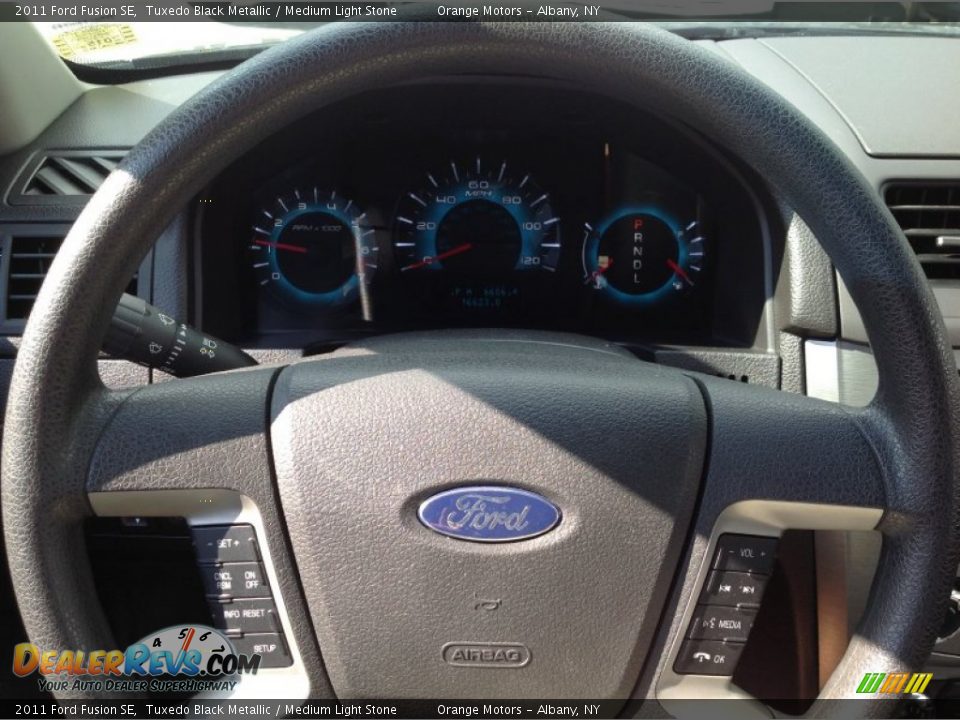 2011 Ford Fusion SE Tuxedo Black Metallic / Medium Light Stone Photo #9