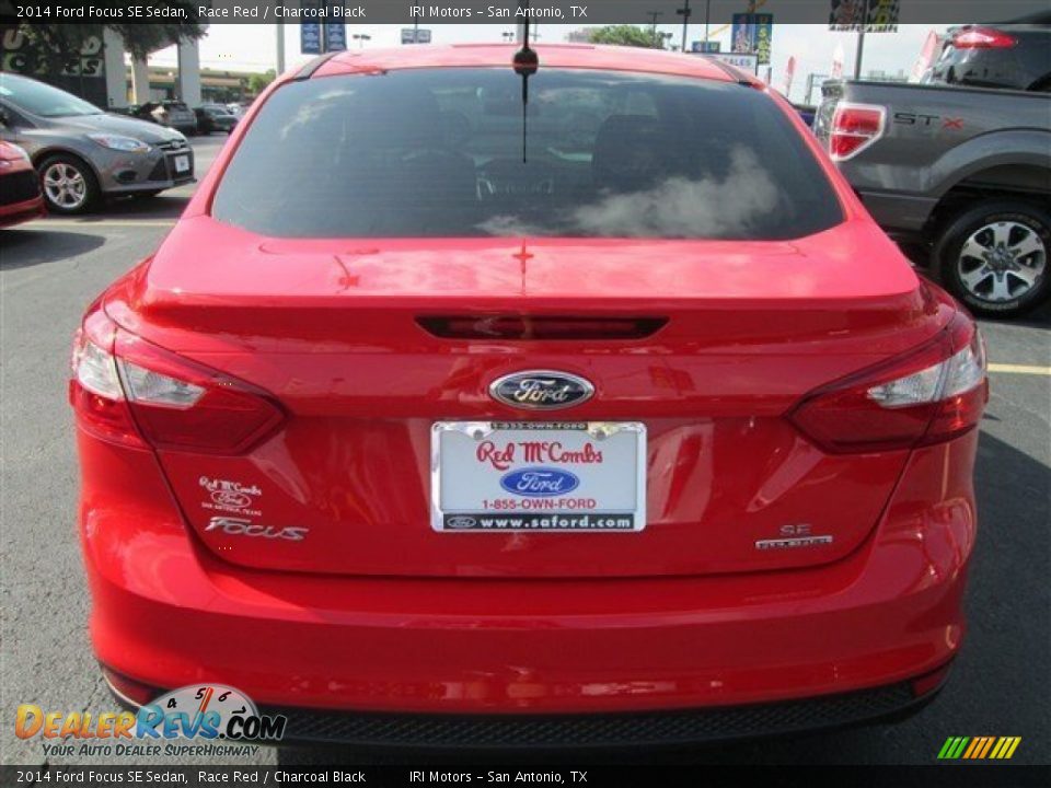2014 Ford Focus SE Sedan Race Red / Charcoal Black Photo #5