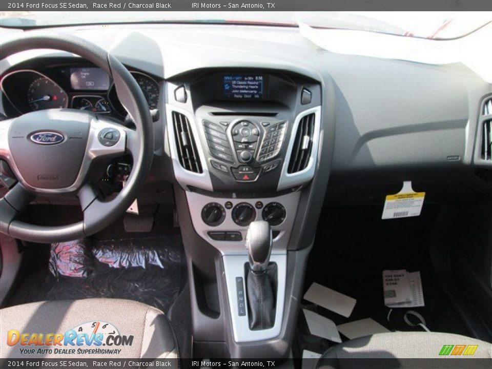 2014 Ford Focus SE Sedan Race Red / Charcoal Black Photo #9