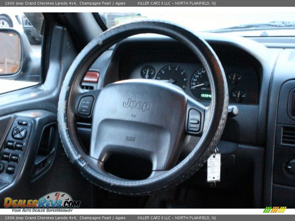 1999 Jeep Grand Cherokee Laredo 4x4 Champagne Pearl / Agate Photo #32
