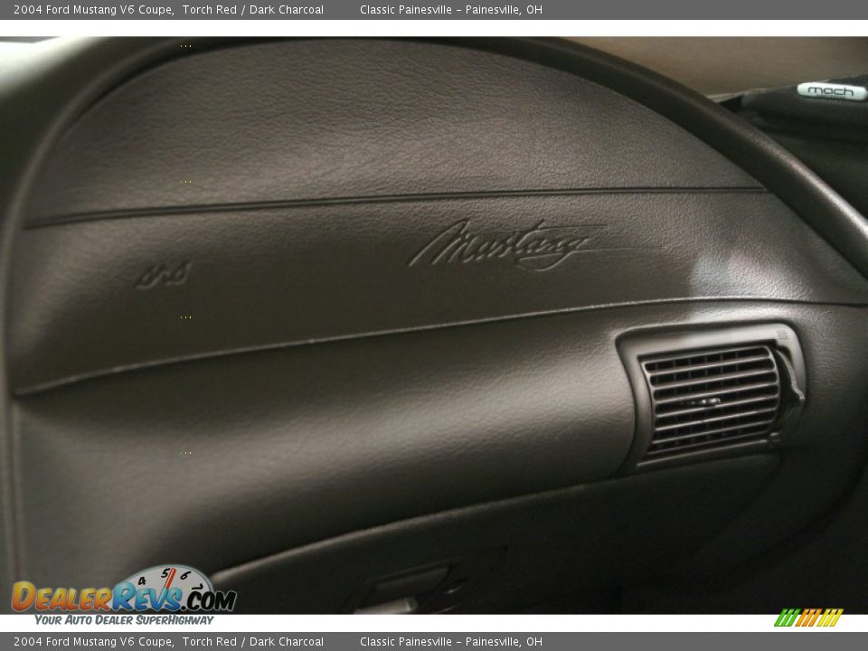 Dashboard of 2004 Ford Mustang V6 Coupe Photo #16