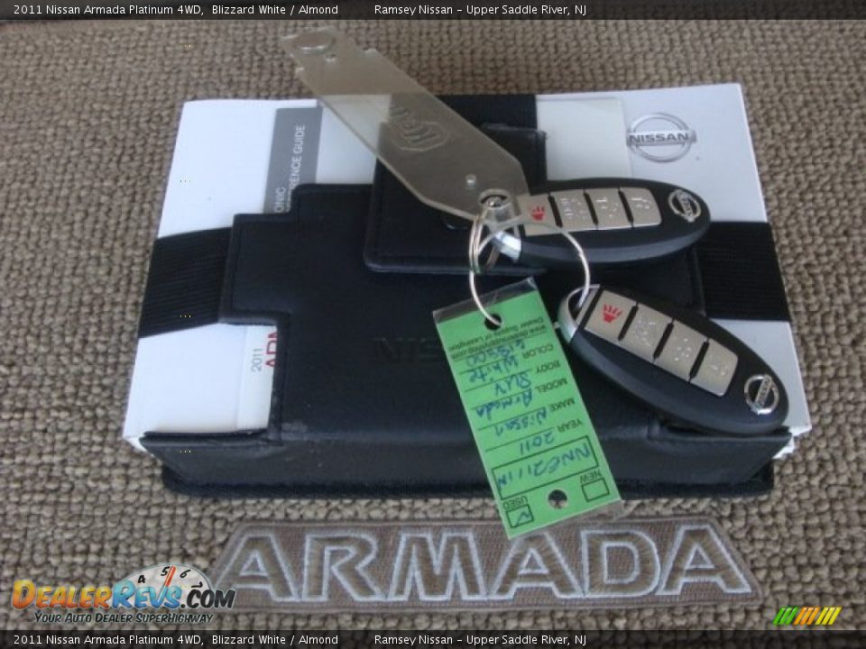 2011 Nissan Armada Platinum 4WD Blizzard White / Almond Photo #28