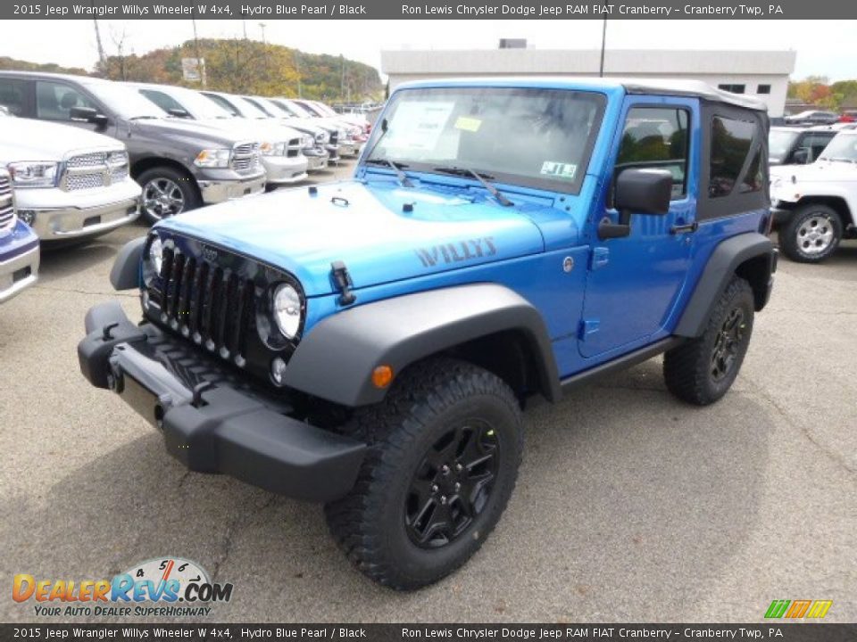 Front 3/4 View of 2015 Jeep Wrangler Willys Wheeler W 4x4 Photo #2