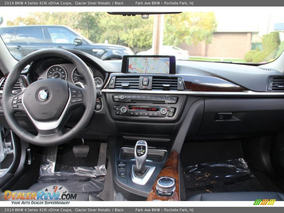 Dashboard of 2014 BMW 4 Series 428i xDrive Coupe Photo #16