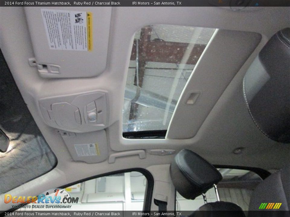 2014 Ford Focus Titanium Hatchback Ruby Red / Charcoal Black Photo #12