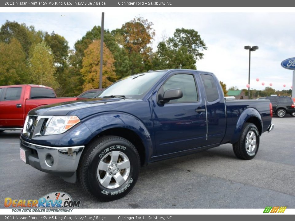 Front 3/4 View of 2011 Nissan Frontier SV V6 King Cab Photo #7