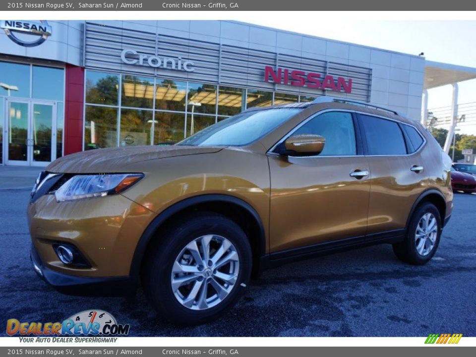 2015 Nissan Rogue SV Saharan Sun / Almond Photo #1