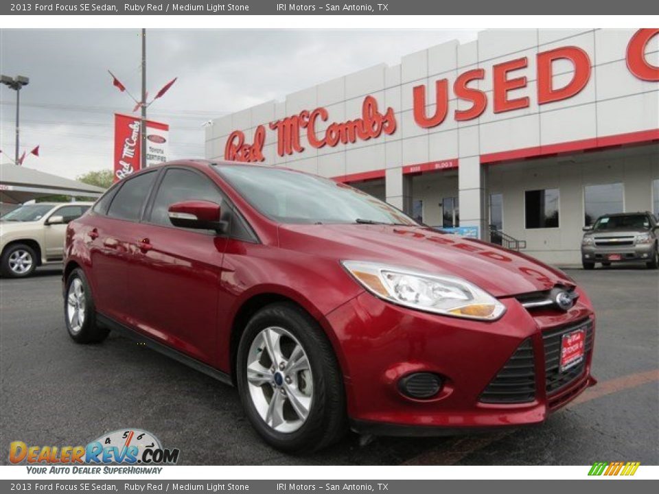 2013 Ford Focus SE Sedan Ruby Red / Medium Light Stone Photo #1