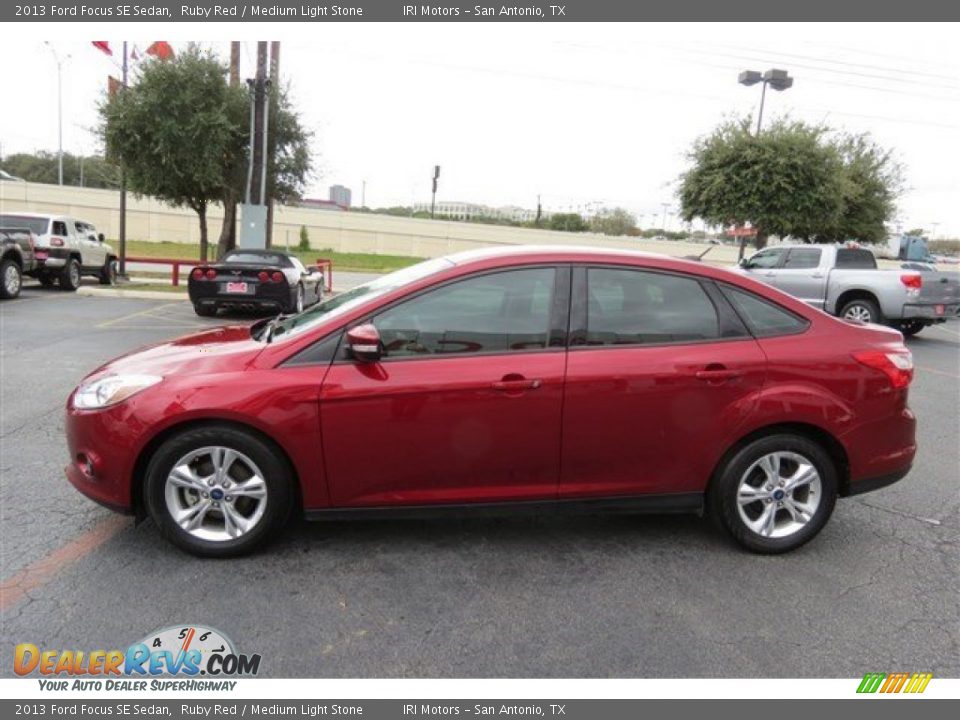 2013 Ford Focus SE Sedan Ruby Red / Medium Light Stone Photo #4