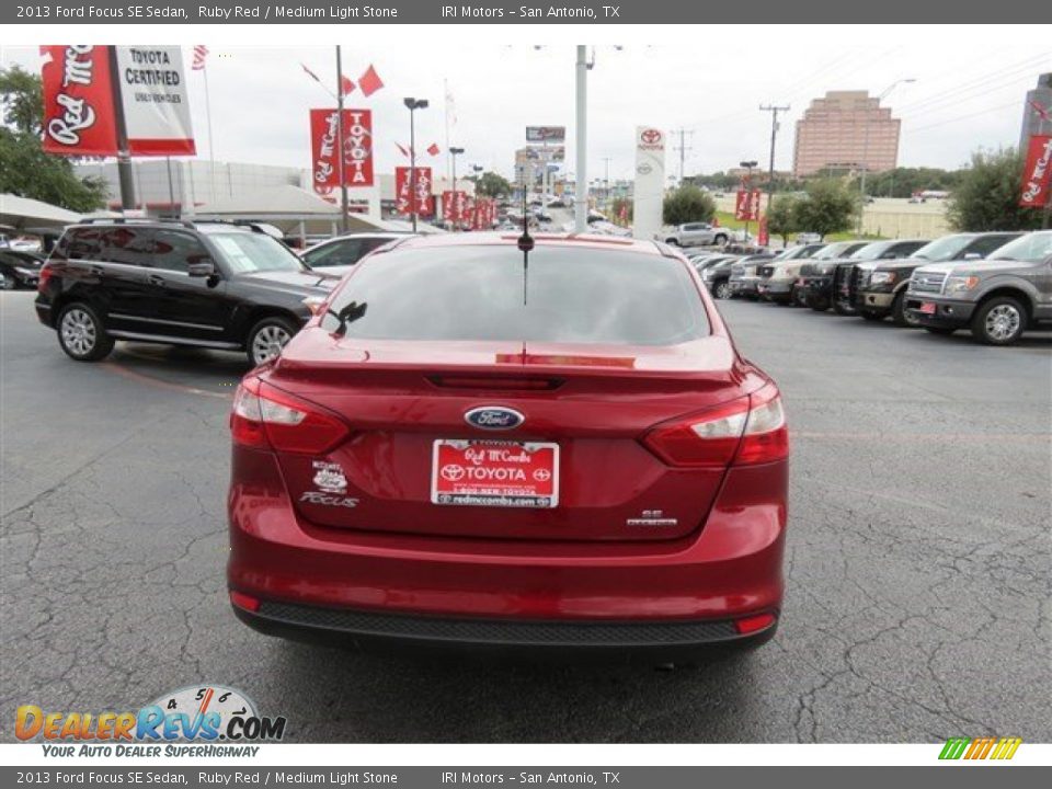 2013 Ford Focus SE Sedan Ruby Red / Medium Light Stone Photo #6
