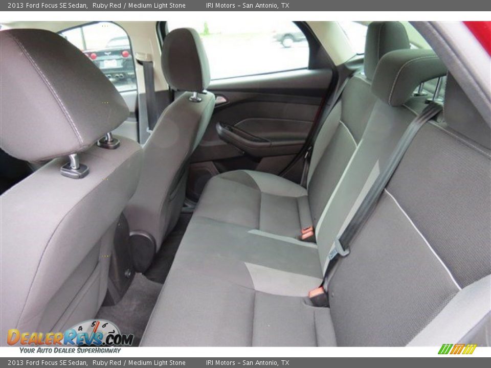 2013 Ford Focus SE Sedan Ruby Red / Medium Light Stone Photo #12