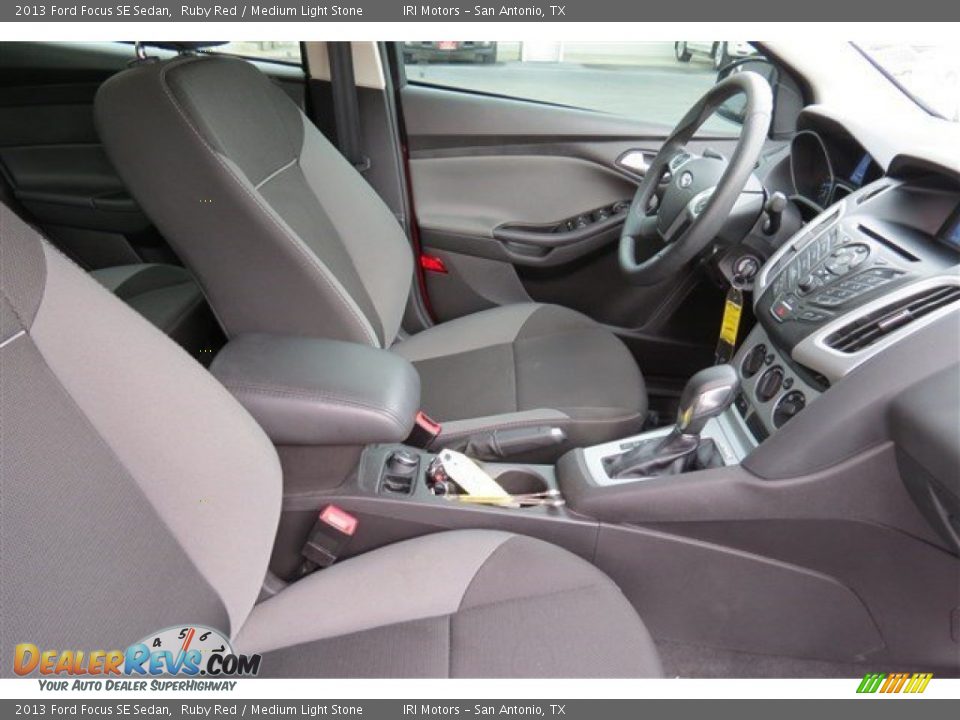 2013 Ford Focus SE Sedan Ruby Red / Medium Light Stone Photo #13