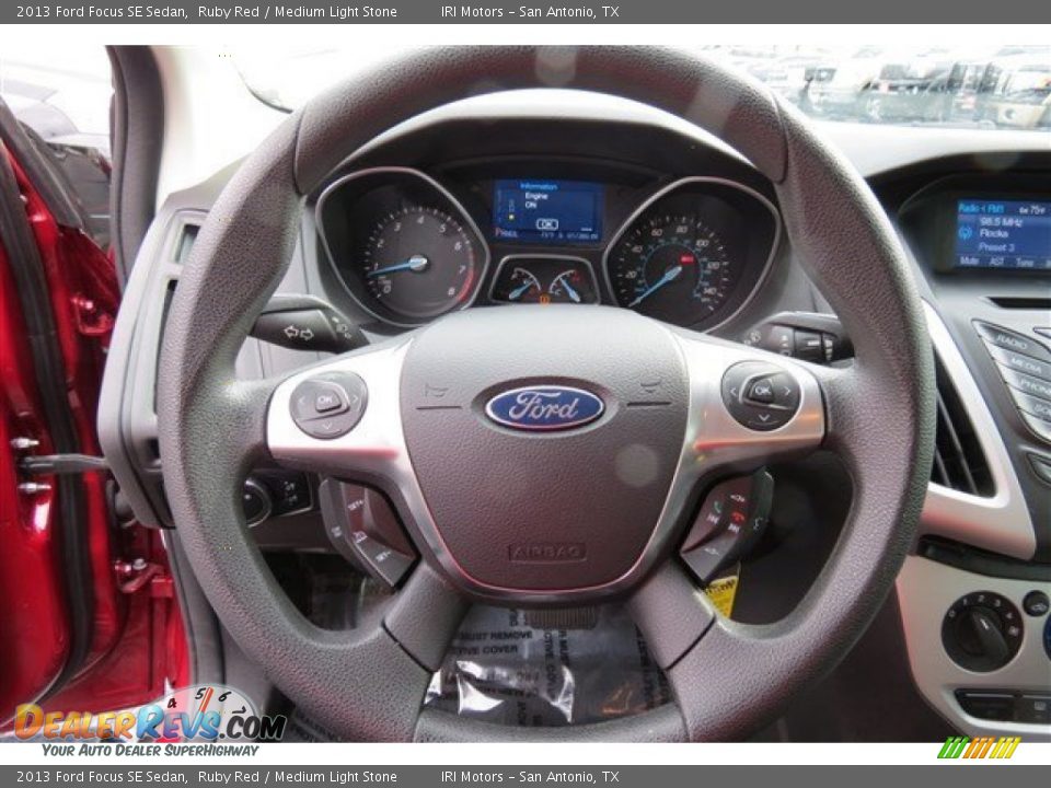 2013 Ford Focus SE Sedan Ruby Red / Medium Light Stone Photo #17