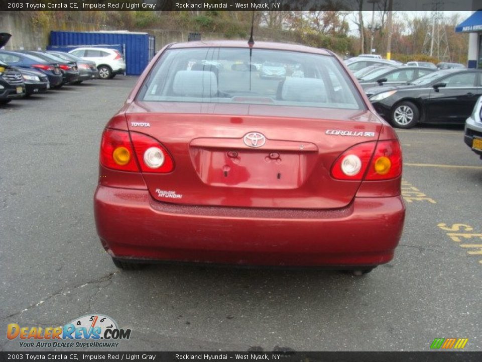 2003 Toyota Corolla CE Impulse Red / Light Gray Photo #5