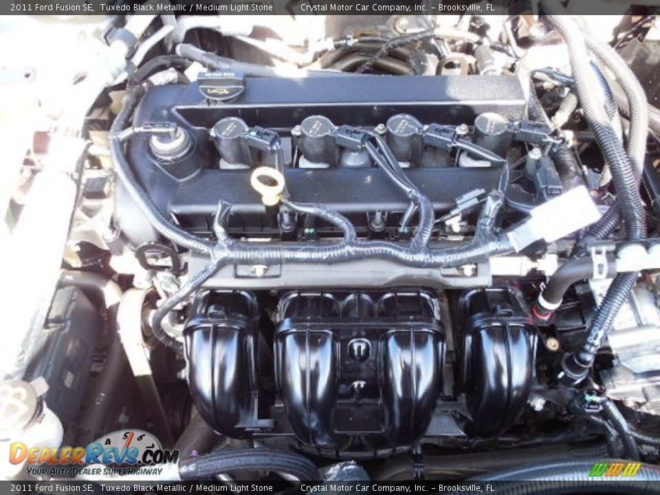 2011 Ford Fusion SE Tuxedo Black Metallic / Medium Light Stone Photo #16
