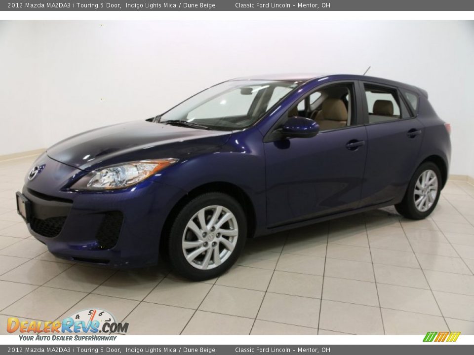 2012 Mazda MAZDA3 i Touring 5 Door Indigo Lights Mica / Dune Beige Photo #3