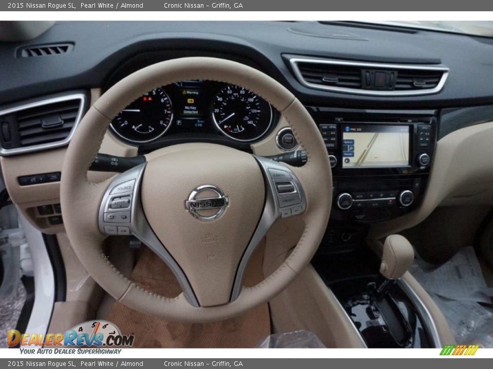 2015 Nissan Rogue SL Pearl White / Almond Photo #10