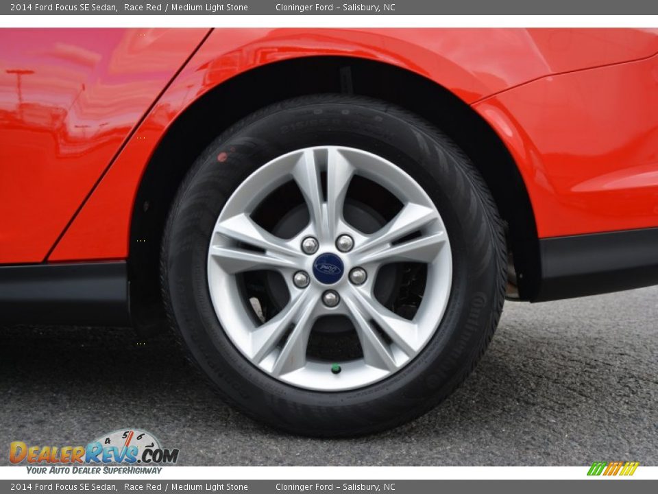 2014 Ford Focus SE Sedan Race Red / Medium Light Stone Photo #11