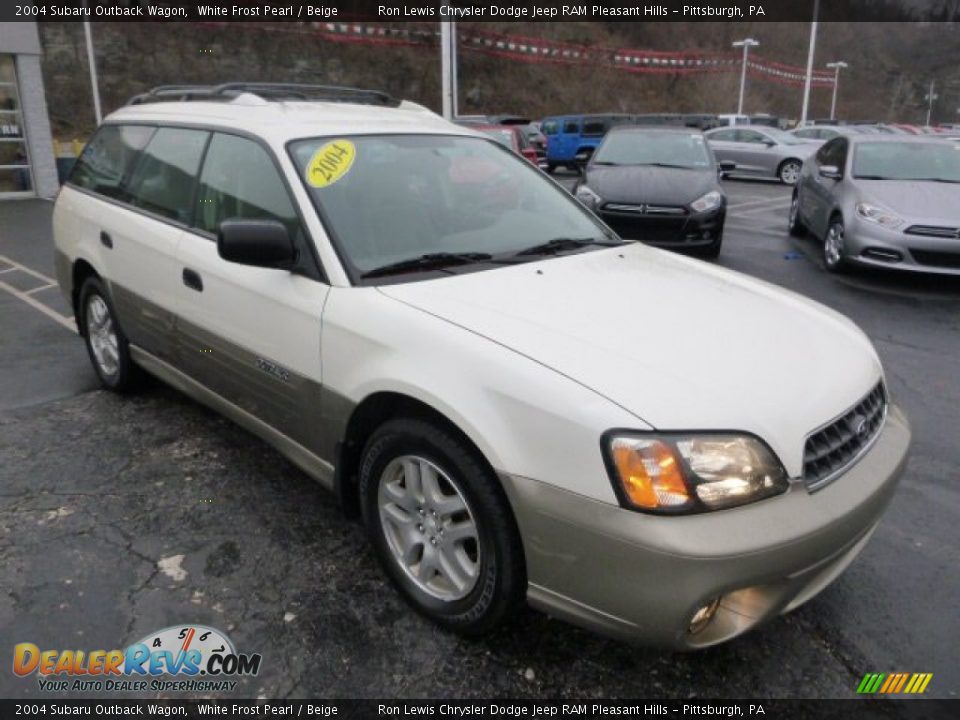 Front 3/4 View of 2004 Subaru Outback Wagon Photo #7