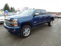 Front 3/4 View of 2015 Chevrolet Silverado 2500HD High Country Crew Cab 4x4 #2