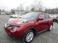 Front 3/4 View of 2015 Nissan Juke SV AWD #7