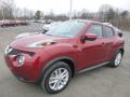 Front 3/4 View of 2015 Nissan Juke S AWD #7