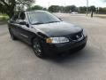 Front 3/4 View of 2003 Nissan Sentra GXE #6