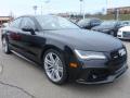 Front 3/4 View of 2015 Audi RS 7 4.0 TFSI quattro #5