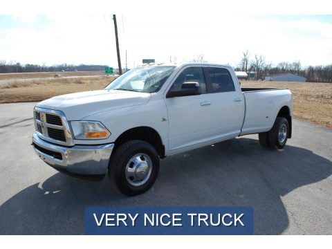 Bright White Dodge Ram 3500 HD SLT Crew Cab 4x4 Dually.  Click to enlarge.